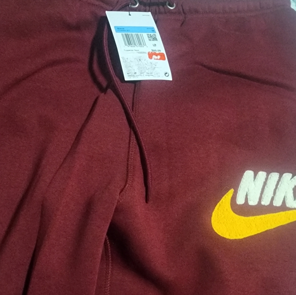 Nike Kids Burgundy Sweatpants with Yellow Logo